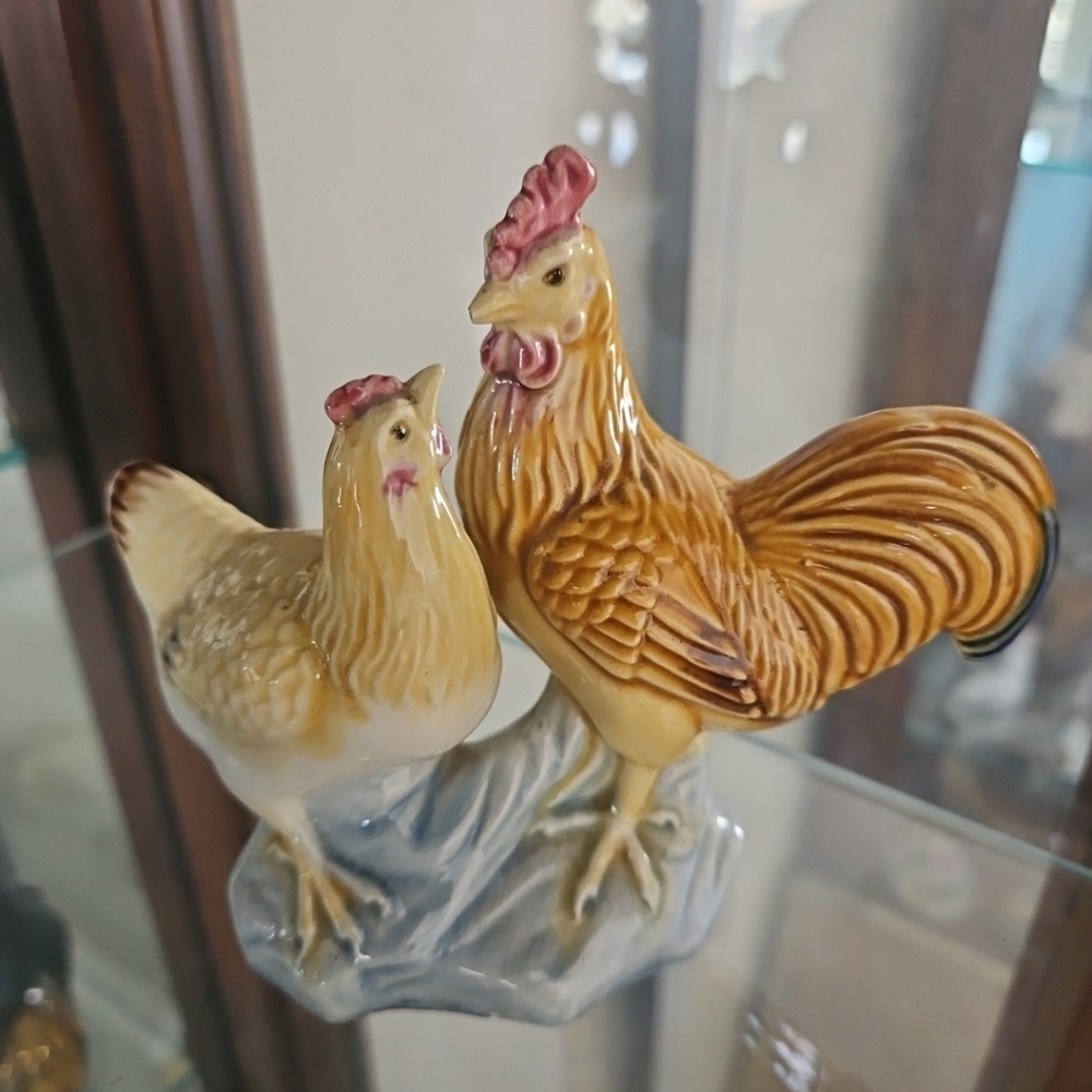Rooster and hen figurine